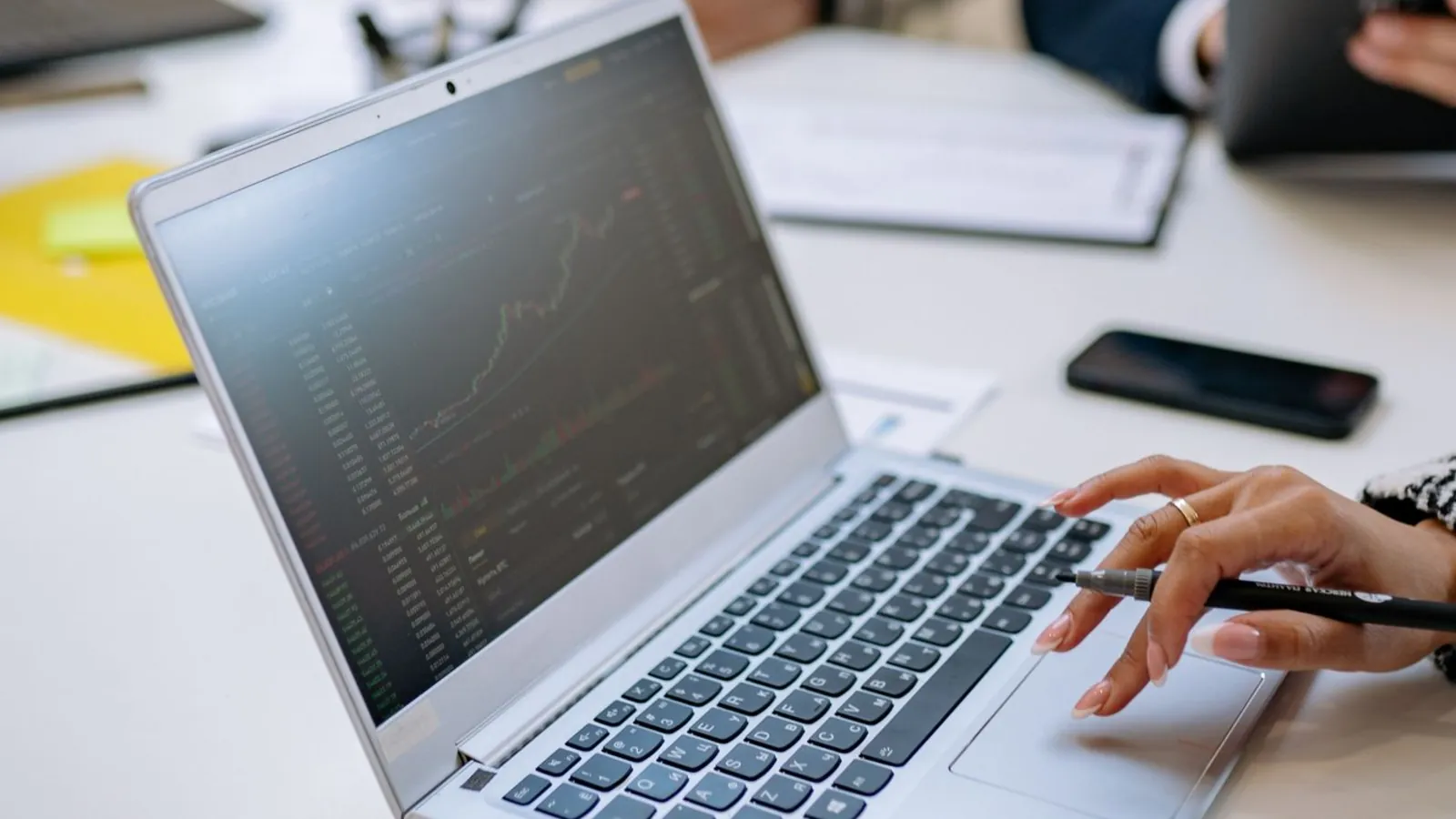 Working through charts on a laptop